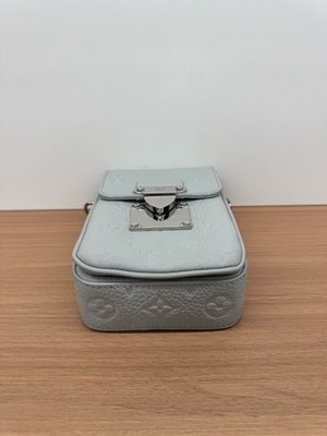 Louis Vuitton Monogram Embossed Leather Vertical Crossbody Phone