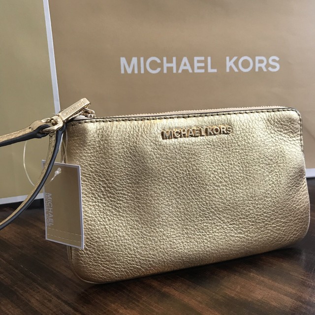 mk gold clutch