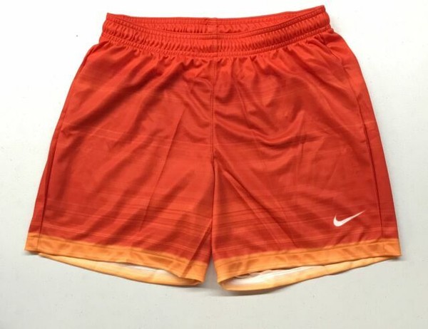 orange nike soccer shorts