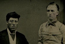 UNHAPPY LOOKING COUPLE. WOMAN HOLDING DOWN MANS WRIST. TINTYPE.