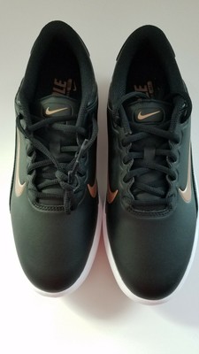 womens black nike shoes with gold swoosh