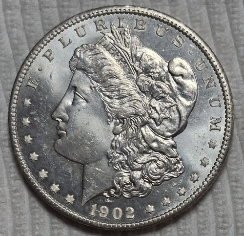 1902 O Morgan Silver Dollar.  Estimated Uncirculated Mint State 62/3. A0752.
