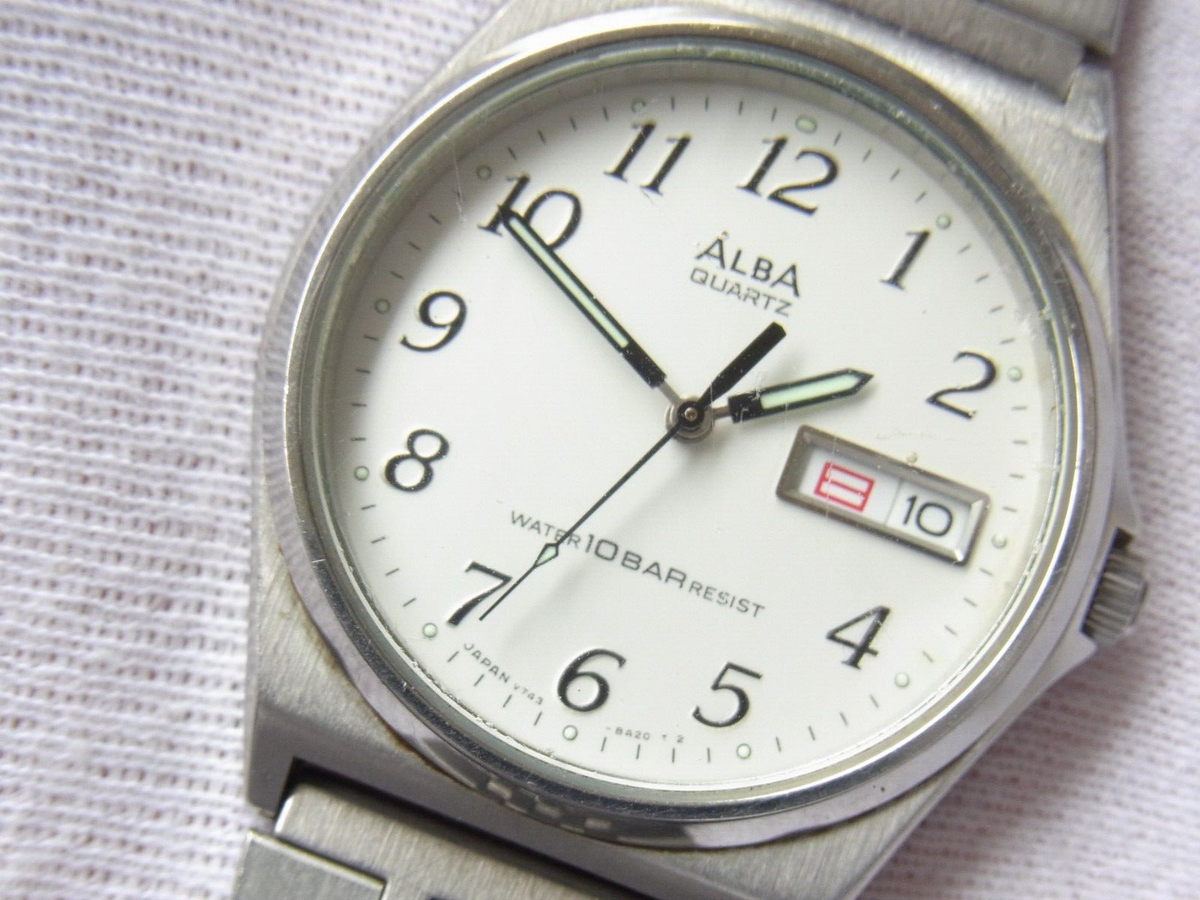 SEIKO ALBA V743-8A10 DAY DATE ARABIC NUMERALS 10 BAR WATER RESIST