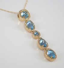 Ciondolo goccia aureola topazio blu taglio ovale 3 ct creato in laboratorio placcato oro giallo 14 carati 18"