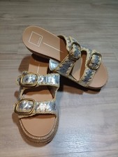 This is a pair of Dolce Vita Wanika sandals with a platinum crackled leather S10