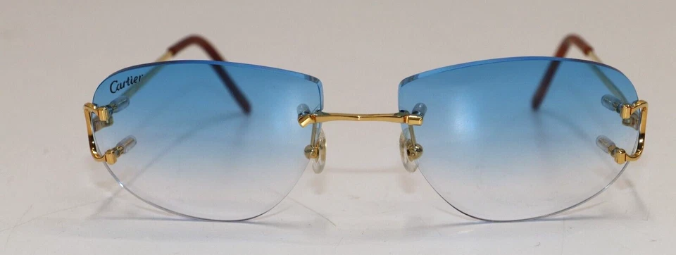 Gafas de sol Cartier Big C decoración doradas con lente tintada degradada azul CT00920 001 Foto 4 de 4