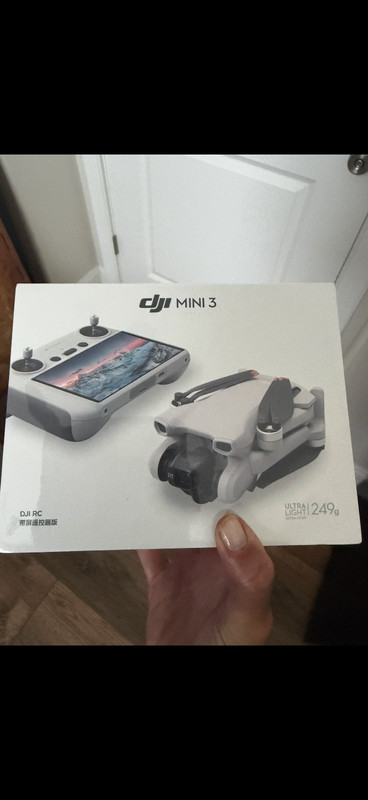 DJI Mini 3 Camera Drone (with RC Remote)
