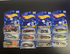 Lot of 12 Hot Wheels Cars Sealed on Card - Various years.