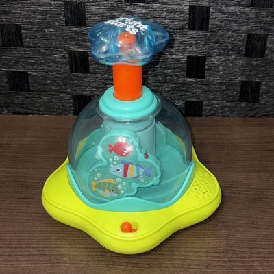 Kids II Bright Stars Press & Glow Spinning Musical Top with Light Used Works