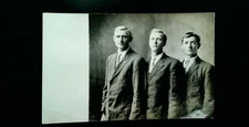 Vintage 1900s Real Photo Postcard of Three Men in Suits AZO Back