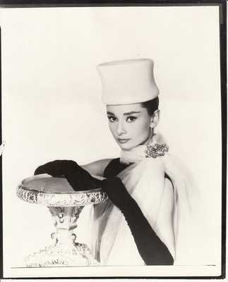 Audrey Hepburn wears black gloves and 