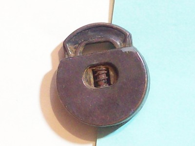 KEY - NONE - LOCK PLASTIC SPRING LOADED FUNCTION?