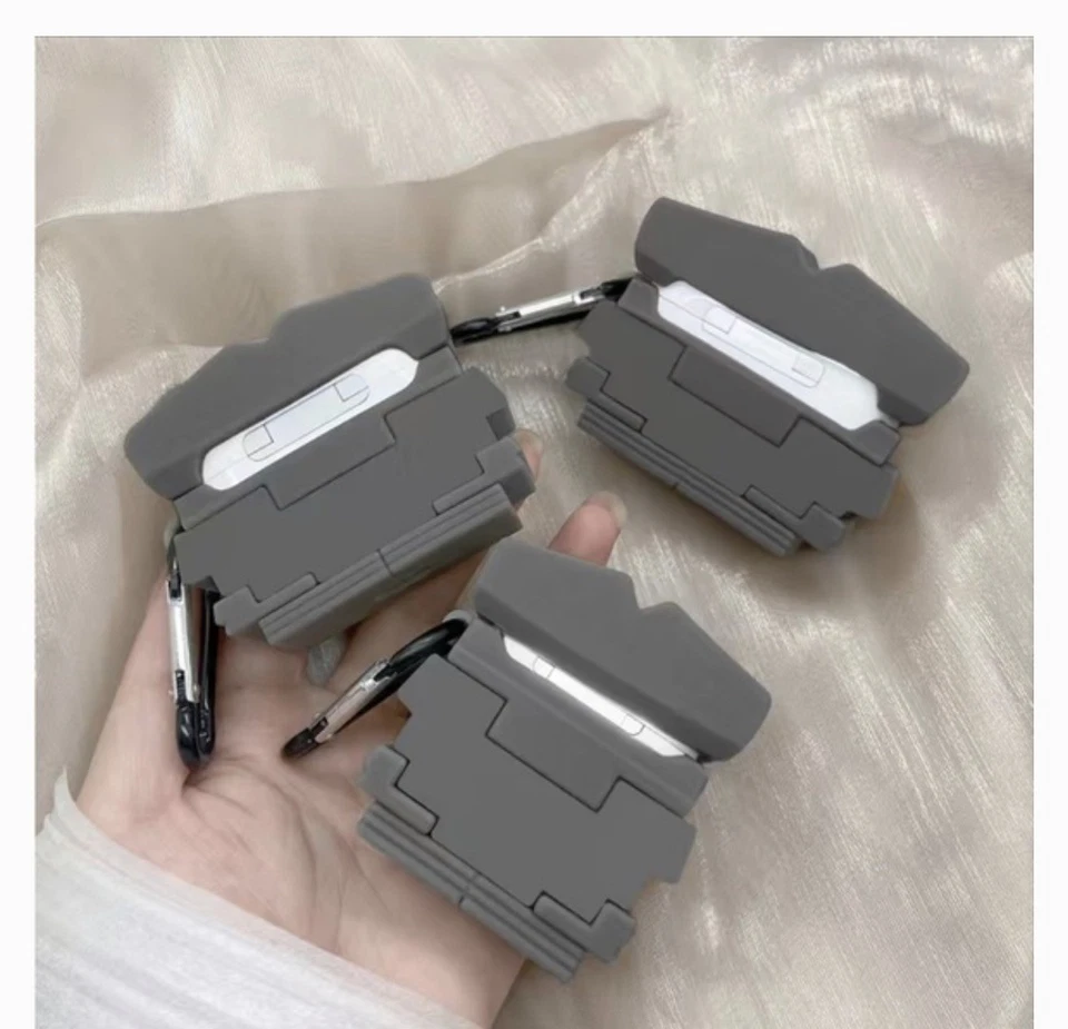 Estuche Wall-E Pixar y AirPods incluidos pero no sostienen la carga Foto 2 de 4