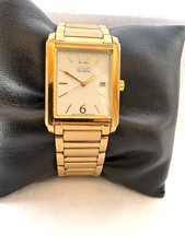 Citizen Eco Drive Unisex  100 MT WR Date Gold Plated Bracelet Watch E011-S033771