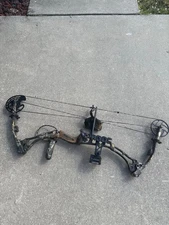  2008 diamond bowtech liberty compound bow  with arrows and lances