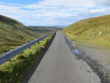 Photo 12x8 Road passing through the Nick of the Balloch Brandy Well Lookin c2017