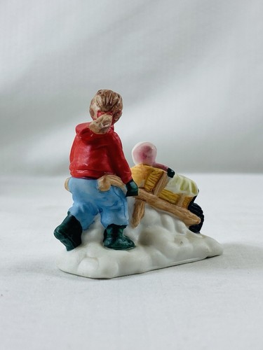 Miniature Christmas Village Scene 2" Child Pushing Infant in a Wheelbarrow - Picture 5 of 10