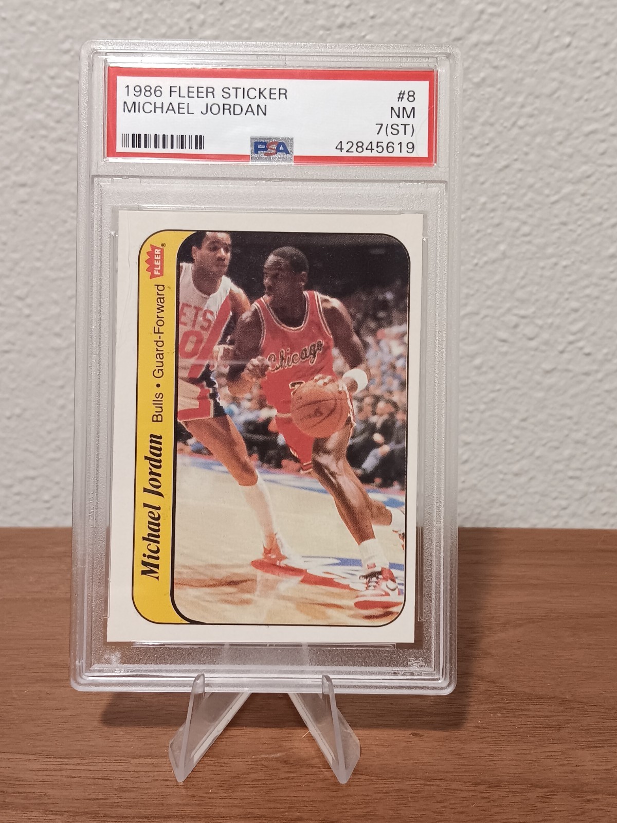 1986 Fleer Sticker #8 - Michael Jordan Rookie (RC) PSA 7 (ST) NM Chicago Bulls view 1