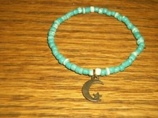 Girl's Stretchable Bracelet Lt. Blue Plastic Beads Metal Moon with Stars Charm