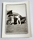 1930s B&W Photo Couple Posing with American Sedan Barn Background Vintage — photo 2
