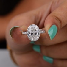 Certified 3 Ct D/VS1 Oval Cut Lab Grown Diamond Solitaire With Accent Halo Ring