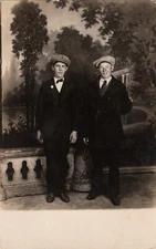 E-559 2 Dapper Young Men in Suits Studio Real Photo RPPC