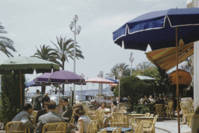 Nice Cafe Scene Patrons seated at outside tables drinking coffee a- 1960 Photo