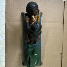 Cast Iron Bank Dentist Pulling Tooth (Book of Knowledge)