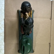 Cast Iron Bank Dentist Pulling Tooth (Book of Knowledge)