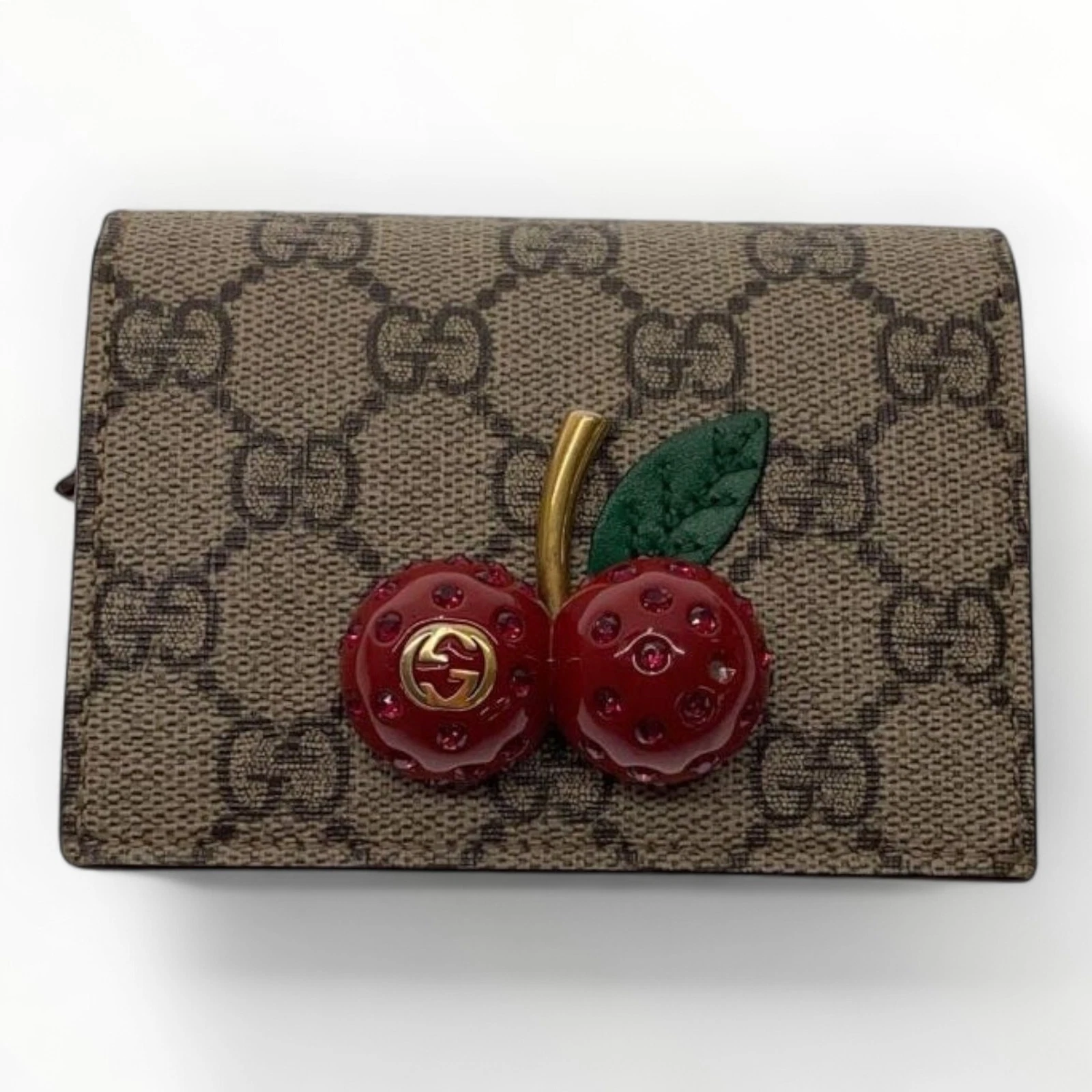 Portefeuille GUCCI bi pli GG Supreme pour femme 3466
