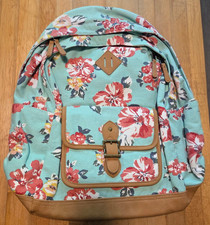 vibrant teal floral pattern with faux leather trim backpack