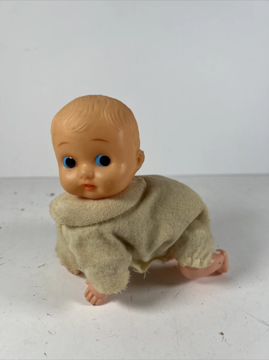 Mechanical best sale baby doll