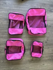 Travel Wise pink packing cubes set of 4 (hole in  mesh)