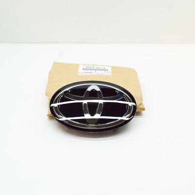 Toyota Corolla E210 Kühlergrill-Emblem vorne 9097502124
