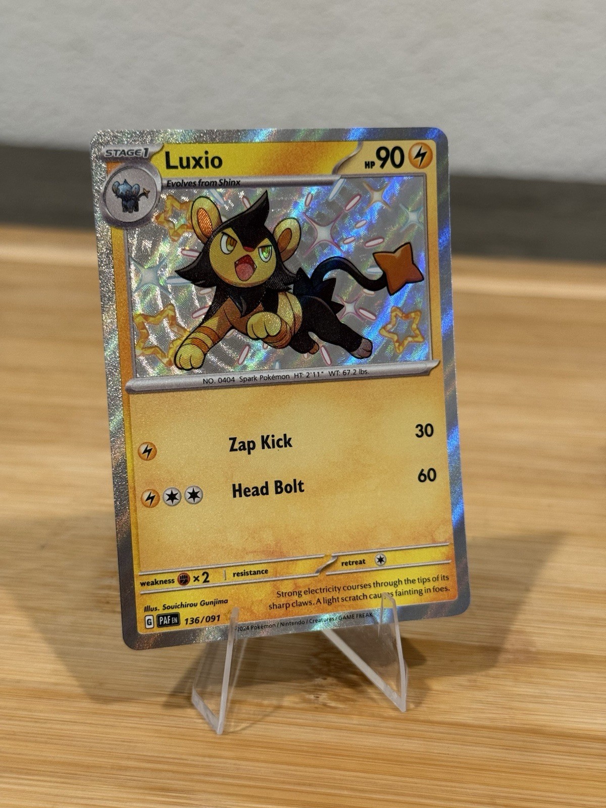 Luxio 136/091  Shiny Rare Paldean Fates Pokemon TCG