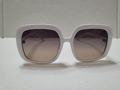 pair of white ''miyya'' brand sunglasses with a black pouch and Cleaning Cloth.