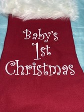 Baby  s first Christmas red and white 18in stocking