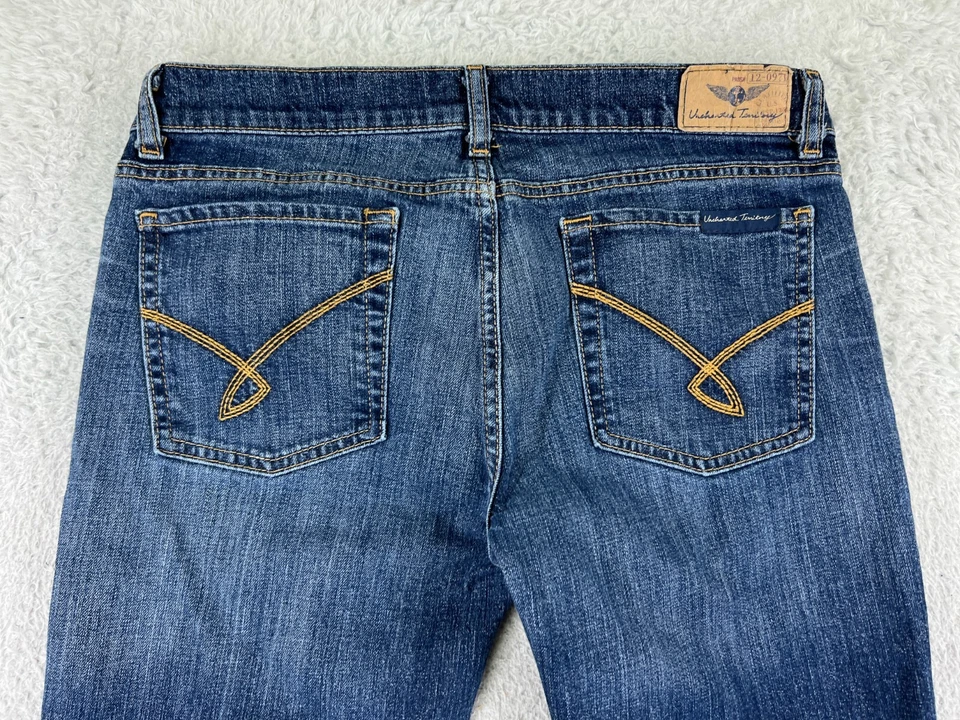 Pantalones de mezclilla Uncharted Territory para mujer 21 azules corte bota mezcla de algodón elásticos Foto 3 de 4