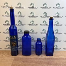 Set of 4 Cobalt Blue Glass Bottles Vintage Decorative Display Accent