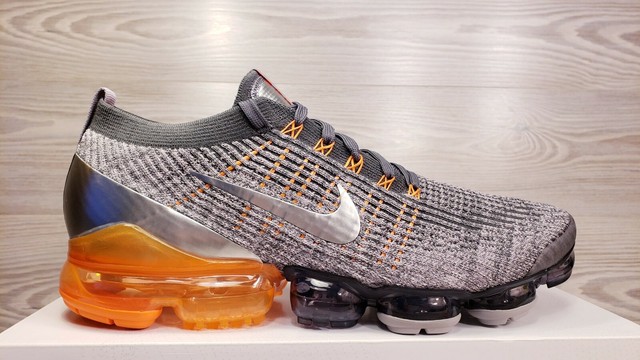 orange and grey vapormax