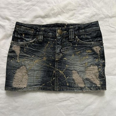 D.i.a. Distressed denim micro mini skirt with gold paint splatter