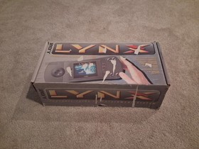 Orginal atari lynx with case, 8 games and case
