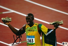 USAIN BOLT SIGNED 12x8 OLYMPICS LEGEND JAMAICA PHOTO (ACG CERT AG16768)