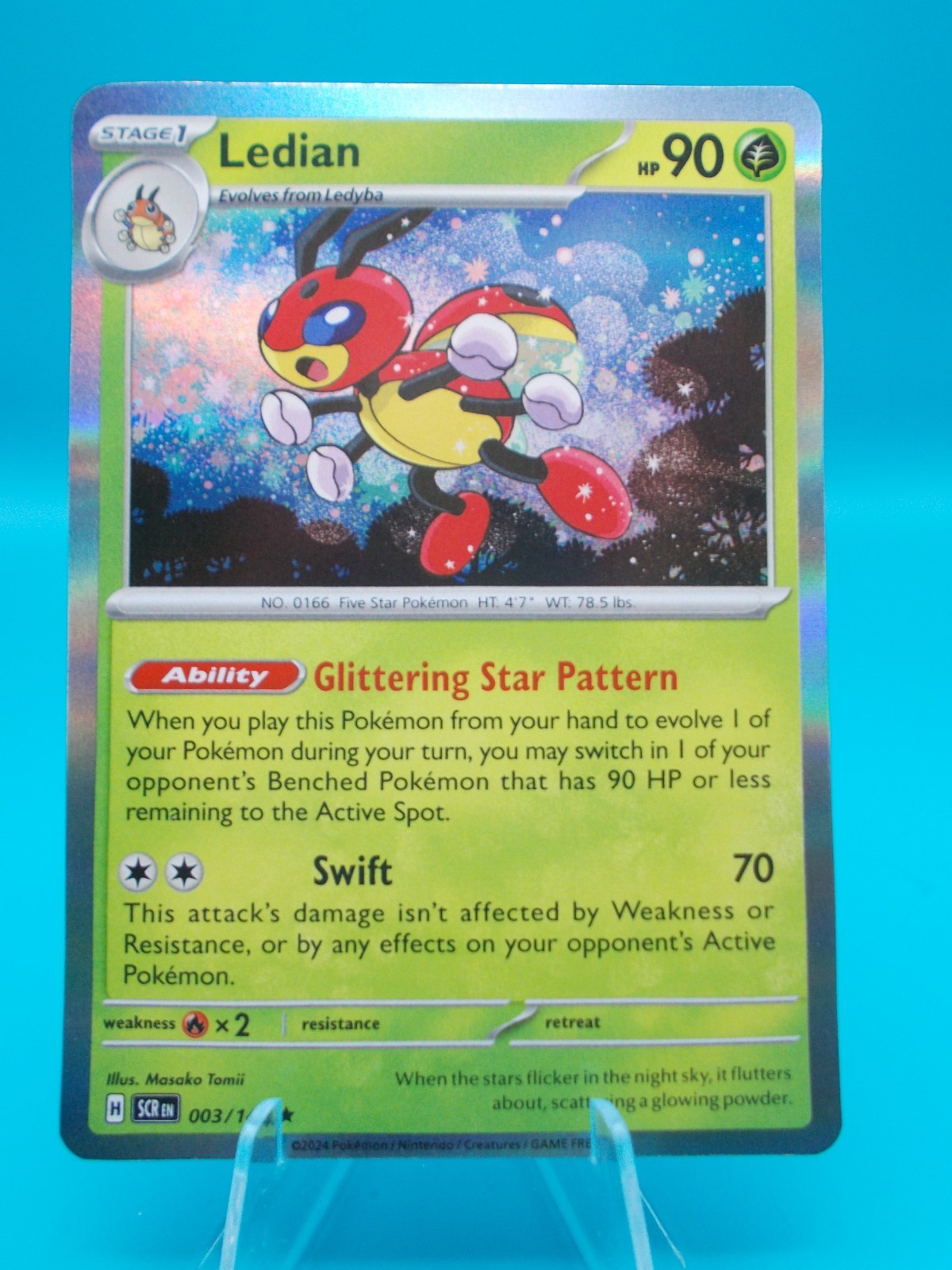 Ledian 003/142 Sv07: Stellar Crown Pokémon TCG Holo Near Mint/Mint