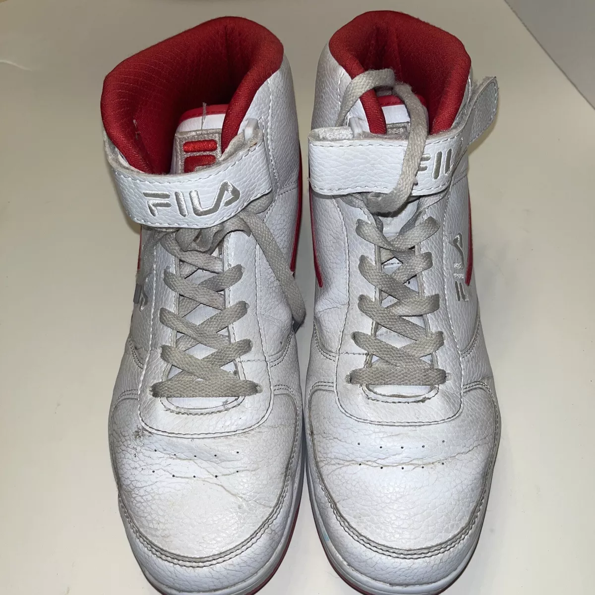Fila white and red deals sneakers