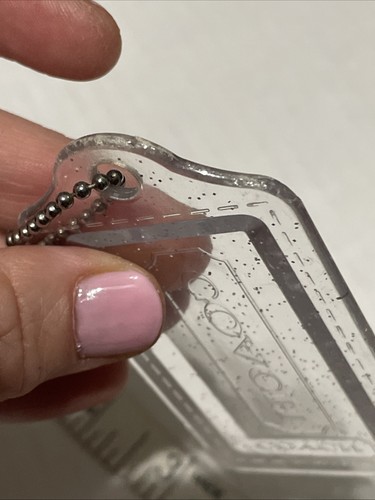 Juego de 2 LLAVEROS GRANDES GRIS HUMO COACH AMAPOLA Y PLATA TRANSPARENTE BRILLANTE ETIQUETA COLGANTE - Imagen 6 de 10