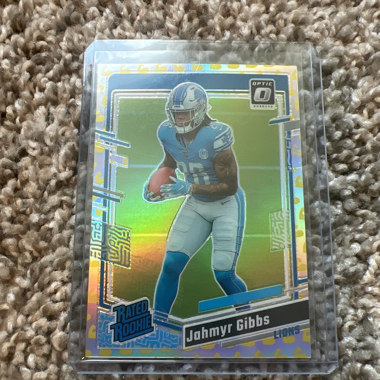 2023 Panini Donruss Optic - Rated Rookie Jahmyr Gibbs #236 Flex Prizm /149 (RC)