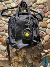 New without tags small multi compartment backpack with attached purse black