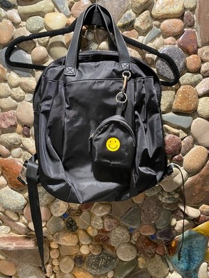New without tags small multi compartment backpack with attached purse black
