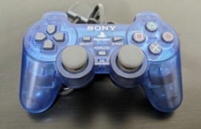 2 Pack PlayStation 2 DualShock 2 controllers. One Cord One Wireless